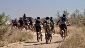 cyclists on dirt road