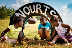 Just across the road from the Timbavati and Thornybush private nature reserves lies Nourish Eco Village, a community development project connecting children to their wildlife heritage. Photo: Sabrina Chielens.