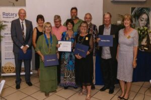 Left to right: Alan Partington, Past President Wilna Mew, President Christine du Preez, Michael Henderson, Lovelle Henderson, Past President Rose White, behind her David Bertram, Paul White and Past President Hazel Partington. The tall gentleman in the back is Anton Lategan who collected founder President John Lategan’s posthumous award.